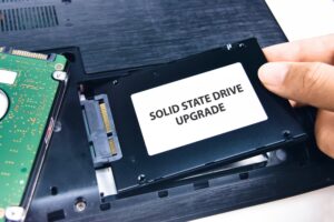 technician installs solid state drive ssd laptop computer 41472 883